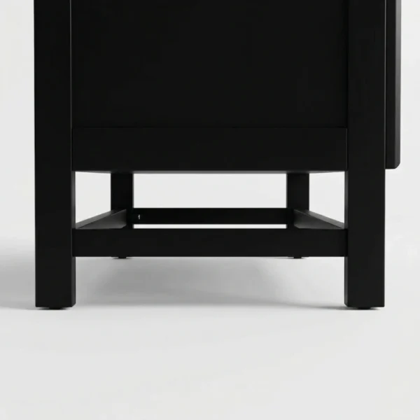 Arcane Wardrobe - Black (7) Close-up of the short angled black legs and sturdy base of the Arcane modern rattan wardrobe.