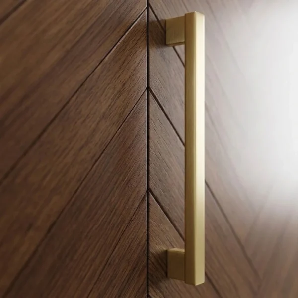 Brunel Wardrobe (6) wardrobe brass door handle close up on walnut herringbone panel