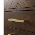 Brunel wardrobe brass drawer handle close up on walnut drawer front