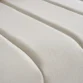 macro close view of beige cushions of sofa