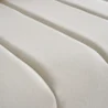 macro close view of beige cushions of sofa