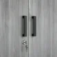 Detail shot of the minimalist elongated metal handles on the bespoke 2 door bedroom Almirah.