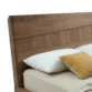 close view of wooden headboard