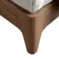 close view showing wooden bed leg