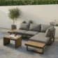 angled view of grey sectional sofa in a matching background