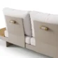 close view of sectional sofa seat back showing grey covers and knobs