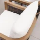 upper close view of dining chair showing premium white upholstery