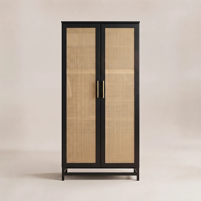 Front view of black two-door wardrobe with natural cane panels