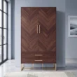 Brunel wooden wardrobe styled in a modern bedroom with chevron doors and brass base