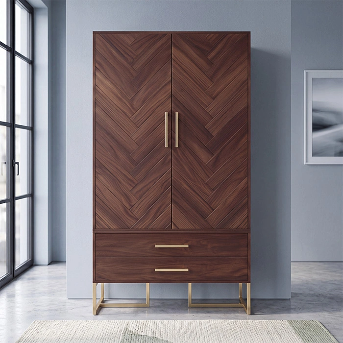 Brunel wooden wardrobe styled in a modern bedroom with chevron doors and brass base