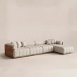Angled view of modular sofa with warm wood side panels