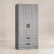 Angled view of Frost Wardrobe in grey finish with two doors and drawers