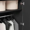 Close-up of the premium fluted wood texture and scratch-resistant foil coating on the Graino modern wardrobe doors.