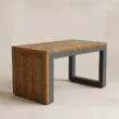 Angled view of matching outdoor table with teak detailing