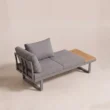 Elevated view of sectional module with grey cushions and teak platform