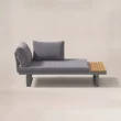 Side view of cushioned sectional module with teak end platform