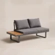 Angled view of two-seat module with grey cushions and teak surface