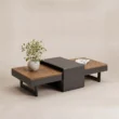 Angled view of low outdoor coffee table with teak and dark metal