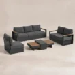 Angled view of Reefline outdoor sofa set with teak accents and grey cushions