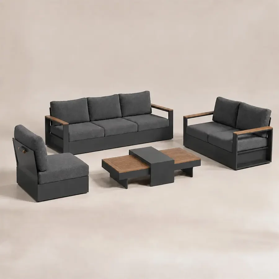 reefline-outdoor-sofa-set-angled-view. Angled view of Reefline outdoor sofa set with teak accents and grey cushions