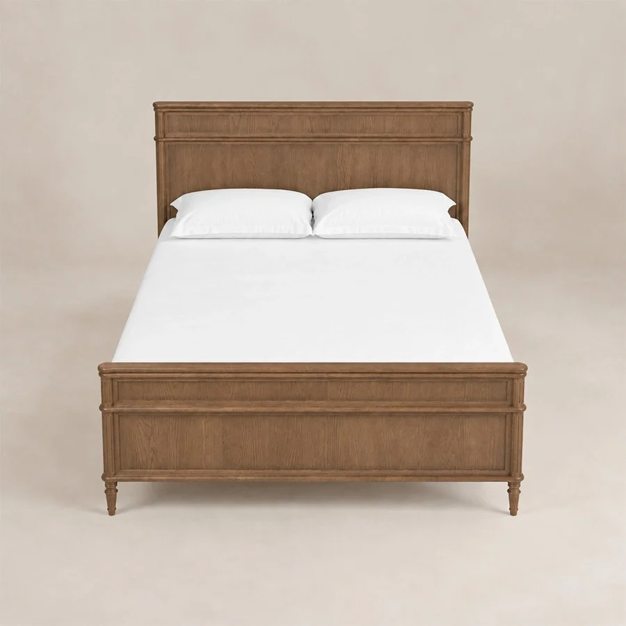 Aldren Platform Bed Front view of Aldren wooden platform bed with warm brown finish, tall panel headboard, framed footboard, and turned legs.