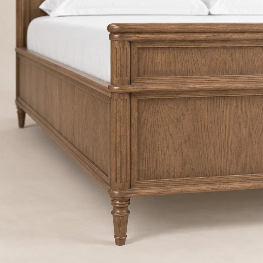 Aldren Platform Bed zoom view Close-up of Modern Aldren wooden bed showing framed wood panels, carved detailing, and turned leg.