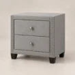 Bellmere Wingback Bedside Table in grey upholstery with two drawers and silver nailhead trim.