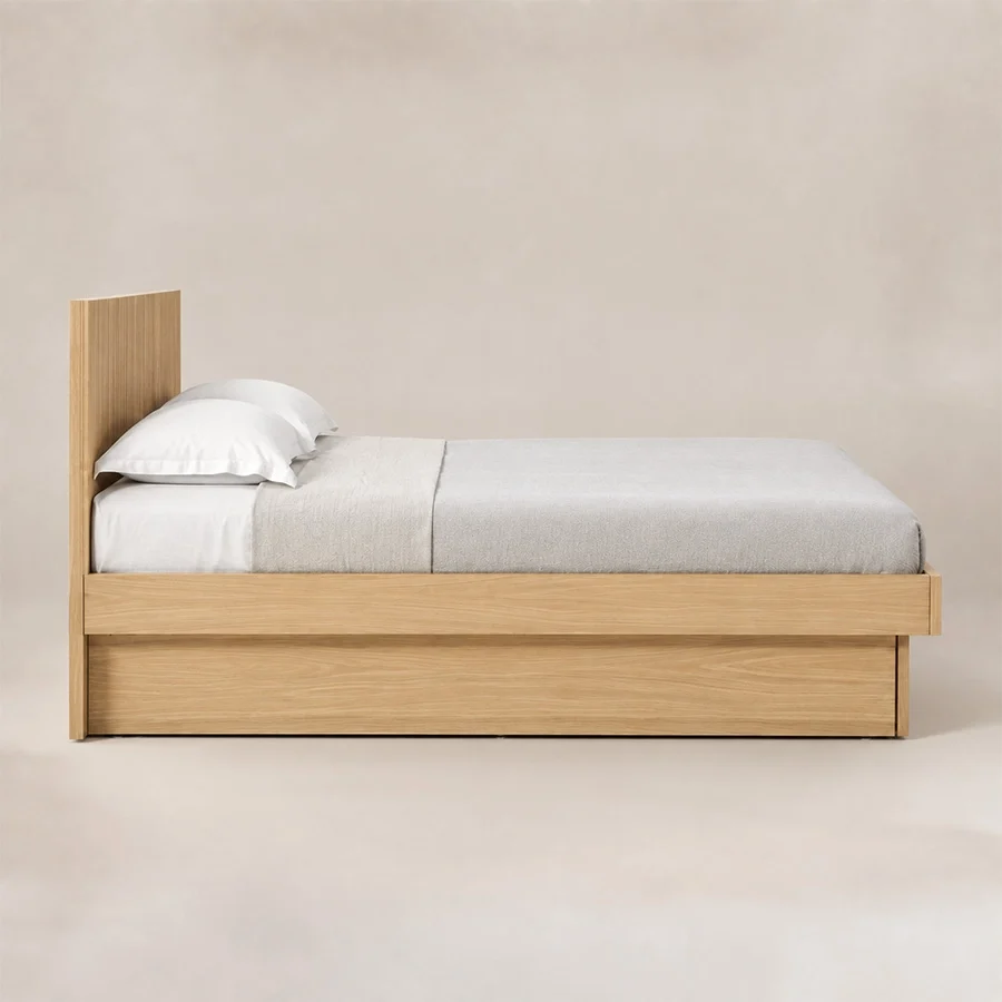 Caldrin Fluted Bed side view Side view of Caldrin Fluted Bed in Natural Sheesham finish with a clean wooden platform frame.