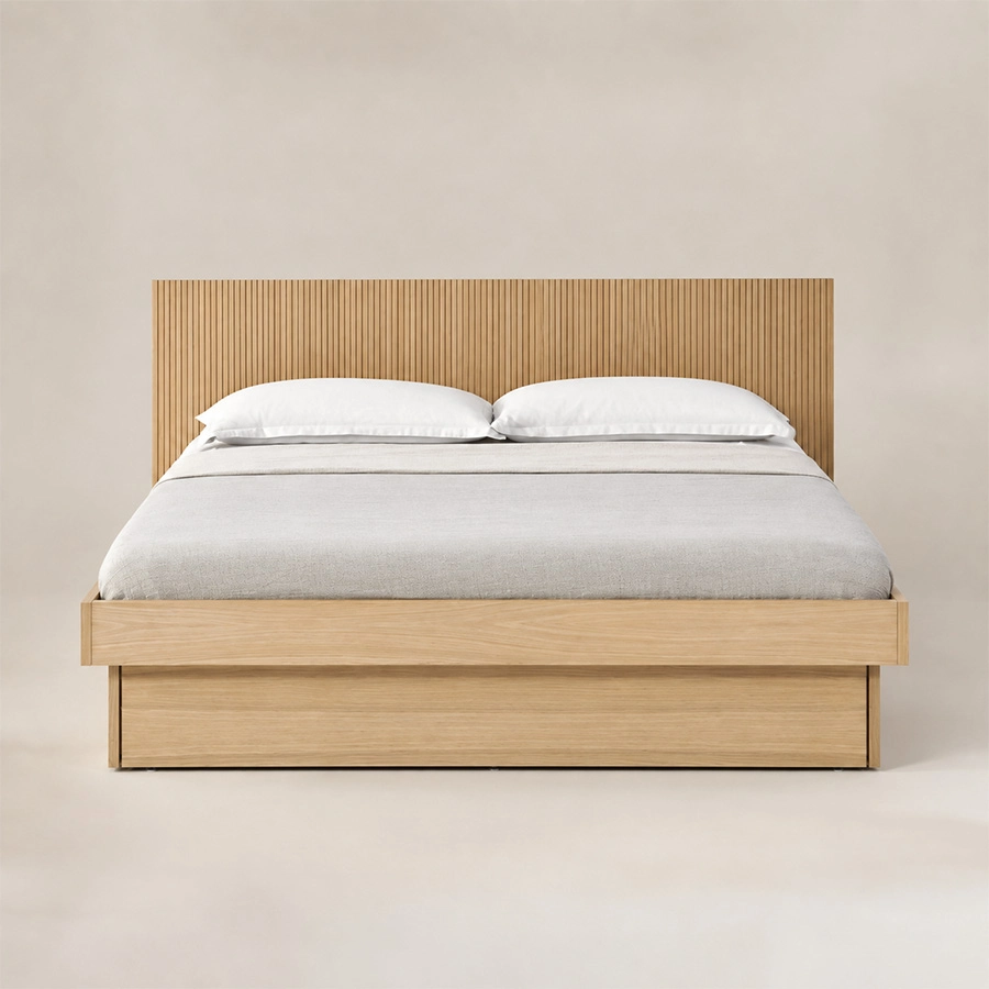 Front view of Caldrin Fluted Bed in Natural Sheesham finish with a vertical fluted headboard and clean wooden frame.