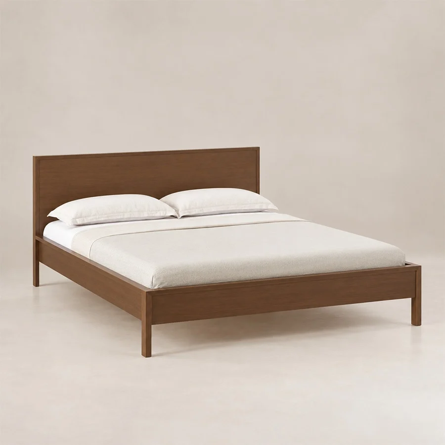 Kelden Linea Bed brown color Angled view of Kelden Linea Bed in Walnut Brown finish with clean panel headboard and slim wooden legs.