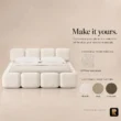 Close-up of Mirelle Upholstered Bed in ivory boucle fabric.