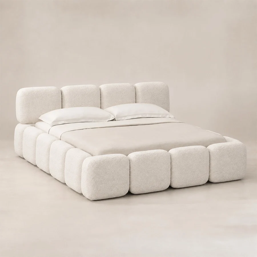 Mirelle Bed view Angled view of Mirelle Upholstered Bed in ivory boucle fabric.