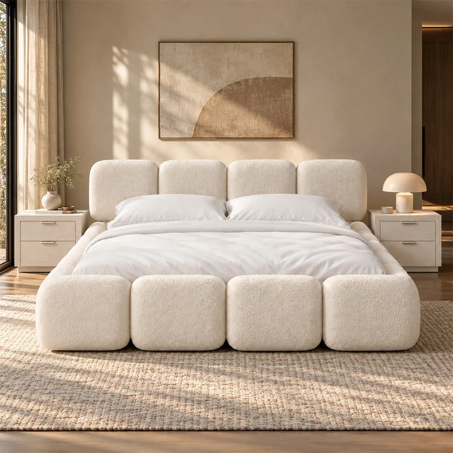 Mirelle Bubble Bed set with background Mirelle Bubble Bed set in off-white boucle upholstery with matching bedside tables in a modern bedroom setting.