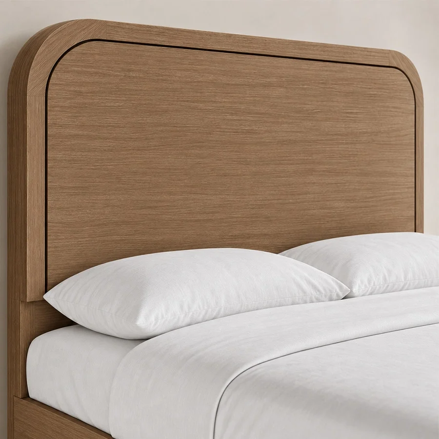 Close-up of Soreven Archline Bed in Warm Walnut finish showing the rounded arched headboard and wood grain detail.