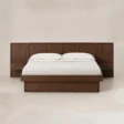 Front view of Veyran Wooden Storage Bed with wide panel headboard, integrated bedside storage, and dark wood finish.