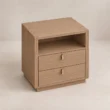 Angled view of Soreven Archline bedside table in Warm Walnut finish with open shelf, two drawers, and brass handles.