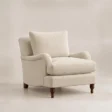 Beige Langmere English Armchair three-quarter view with upholstered seat and wooden legs