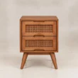 Front view of Maroven Grid matching two-drawer bedside table in Ash Walnut finish with woven rattan drawer fronts and tapered wooden legs.