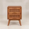 Front view of Maroven Grid matching two-drawer bedside table in Ash Walnut finish with woven rattan drawer fronts and tapered wooden legs.